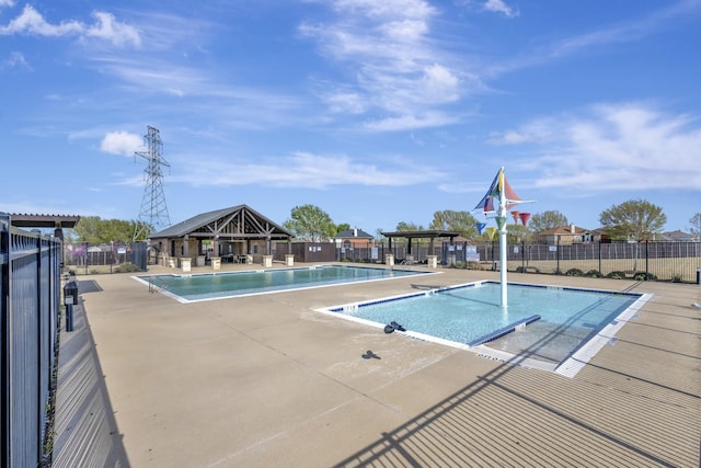 560 Camber St, Saginaw, TX 76131 - pool with a gazebo, a patio area, and fence