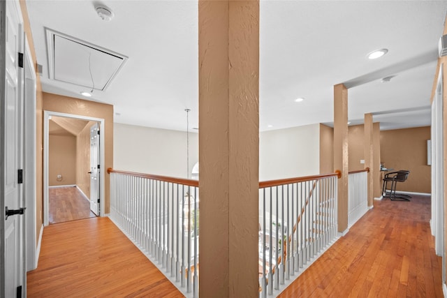 4730 Parkhaven Dr, Garland, TX 75043 - corridor featuring attic access, baseboards, light wood-style flooring, and recessed lighting