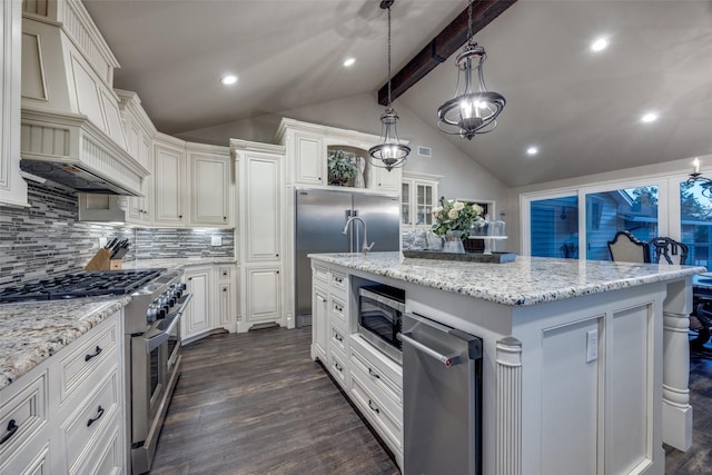 147 Cotton Franklin Rd, Gordonville, TX 76245 - kitchen with vaulted ceiling with beams, appliances with stainless steel finishes, a center island with sink, dark wood-style floors, and decorative backsplash