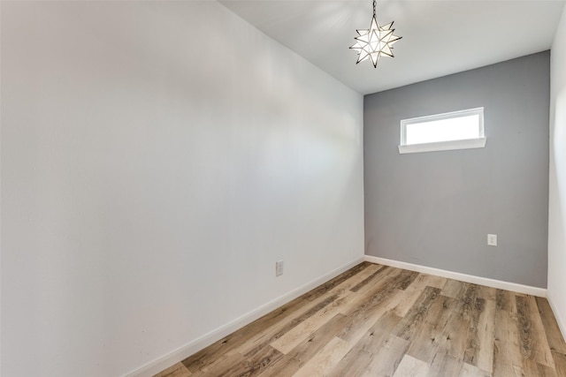 2823 Ingersoll St, Dallas, TX 75212 - unfurnished room with baseboards and light wood-style floors