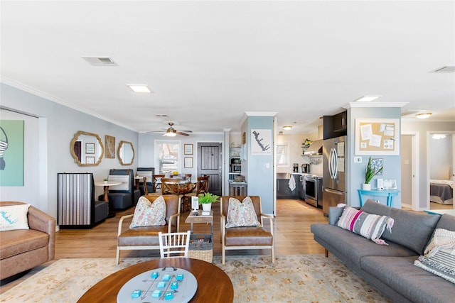 106 Gawayne Dr, Mabank, TX 75156 - living area featuring light wood-style flooring, visible vents, and a ceiling fan