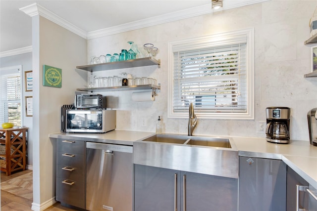 106 Gawayne Dr, Mabank, TX 75156 - kitchen featuring light countertops, a sink, crown molding, and appliances with stainless steel finishes