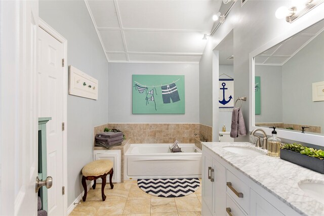 106 Gawayne Dr, Mabank, TX 75156 - bathroom with a bath, double vanity, a sink, and tile patterned flooring