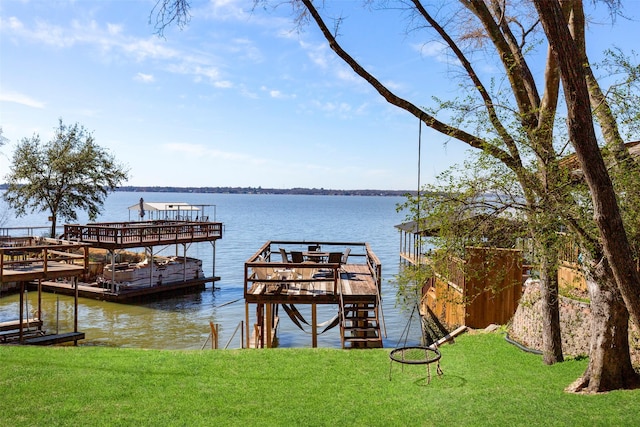 106 Gawayne Dr, Mabank, TX 75156 - view of dock featuring a lawn and a water view