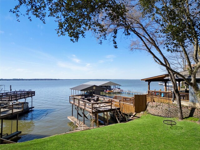 106 Gawayne Dr, Mabank, TX 75156 - view of dock with a water view and a yard