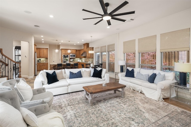 1715 San Jacinto Dr, Allen, TX 75013 - living area featuring ceiling fan, recessed lighting, stairs, and light wood-style flooring