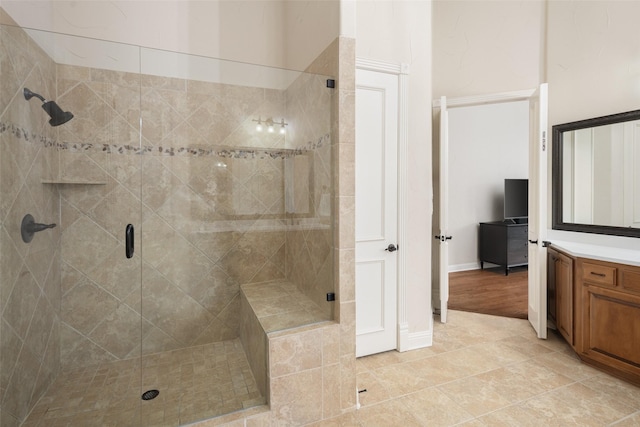 1715 San Jacinto Dr, Allen, TX 75013 - bathroom featuring vanity, a shower stall, baseboards, and tile patterned flooring