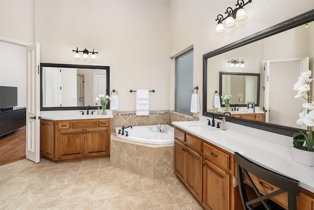 1715 San Jacinto Dr, Allen, TX 75013 - full bath with a bath, a towering ceiling, and two vanities
