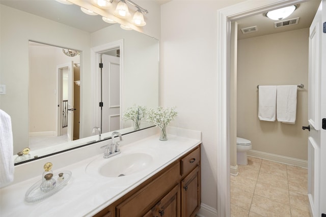 1715 San Jacinto Dr, Allen, TX 75013 - bathroom with vanity, baseboards, toilet, and tile patterned flooring