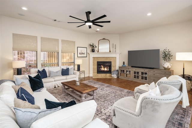 1715 San Jacinto Dr, Allen, TX 75013 - living room featuring ceiling fan, a tiled fireplace, wood finished floors, and recessed lighting