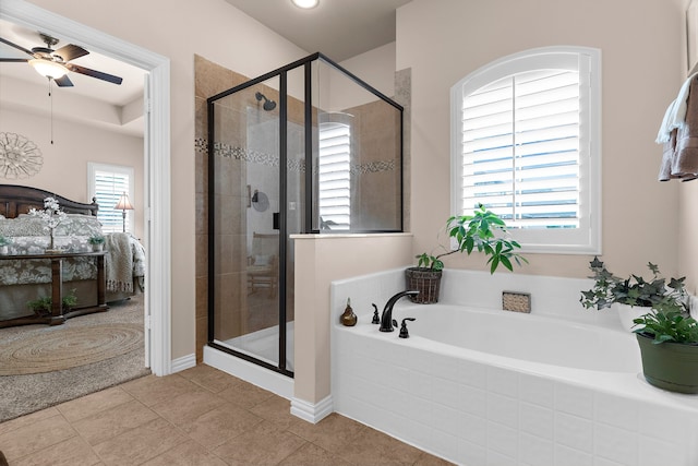 ensuite bathroom with a shower stall, a garden tub, ceiling fan, and connected bathroom