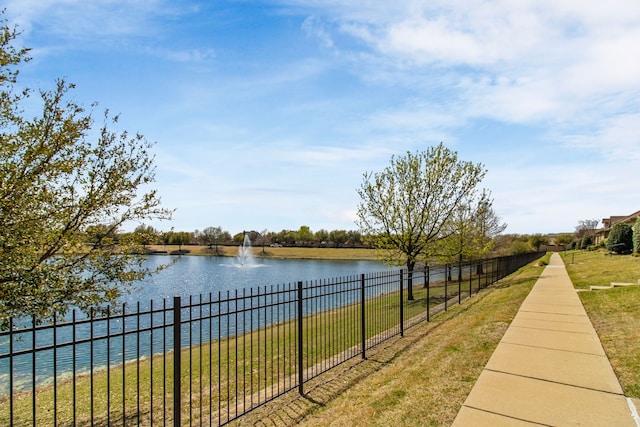 view of water feature featuring fence