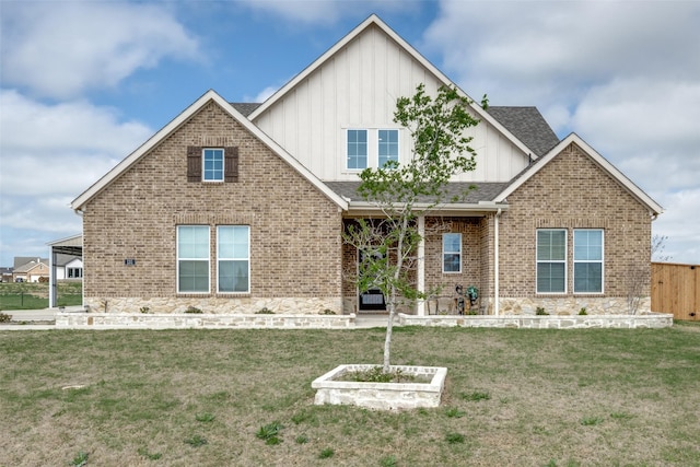 131 Clearwater Ct, Rhome, TX 76078 - craftsman house featuring board and batten siding, a front yard, and brick siding