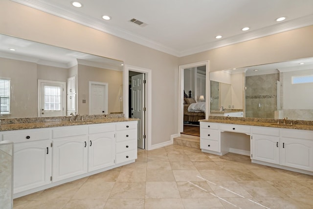 4580 Southgate Dr, Plano, TX 75024 - bathroom featuring two vanities, a shower stall, ornamental molding, recessed lighting, and ensuite bath