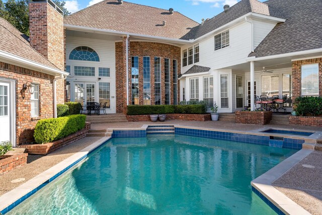 4580 Southgate Dr, Plano, TX 75024 - view of pool featuring a patio, a pool with connected hot tub, and a ceiling fan
