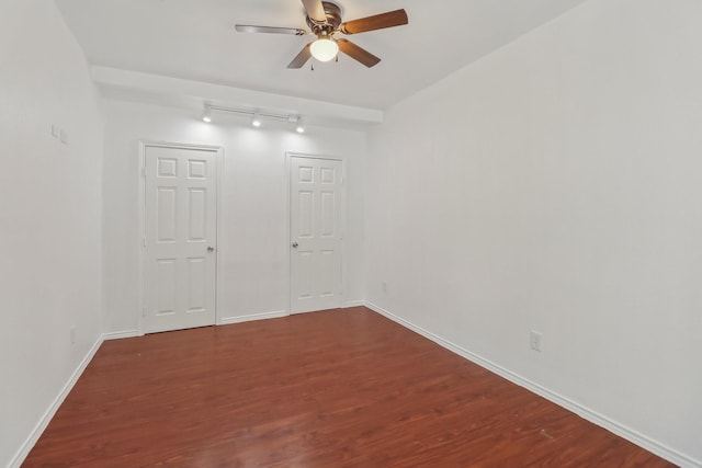 322 W Mcvey Ave, Dallas, TX 75224 - empty room with baseboards, a ceiling fan, rail lighting, and wood finished floors