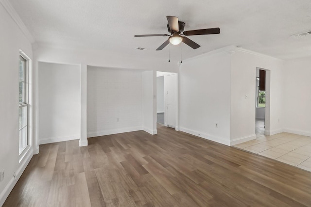 322 W Mcvey Ave, Dallas, TX 75224 - spare room with visible vents, a ceiling fan, and wood finished floors