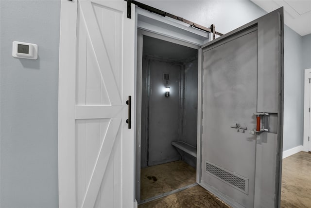 bathroom featuring concrete flooring