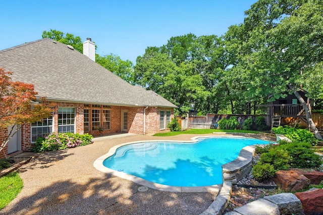 2411 Oak Shadow Ct, Arlington, TX 76017 - view of swimming pool with a fenced backyard and a patio area