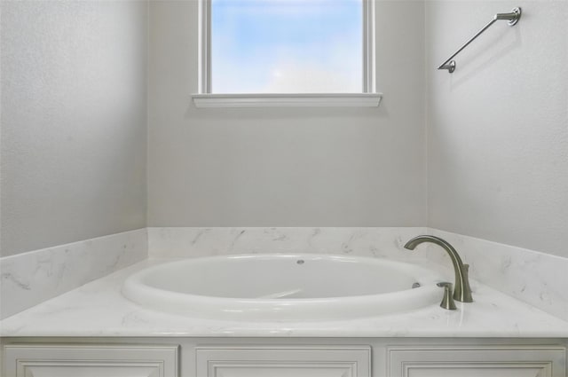 1011 Cardinal Cv, Graford, TX 76449 - full bathroom with a garden tub