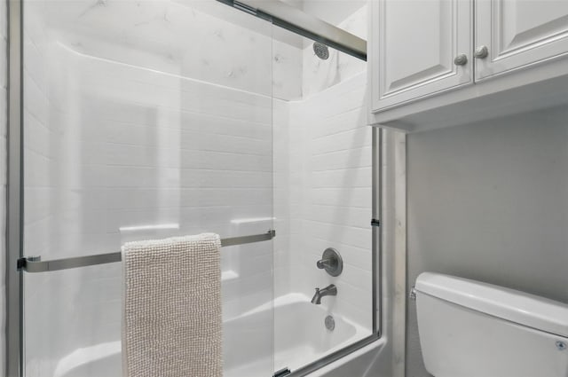 1011 Cardinal Cv, Graford, TX 76449 - bathroom featuring toilet and enclosed tub / shower combo