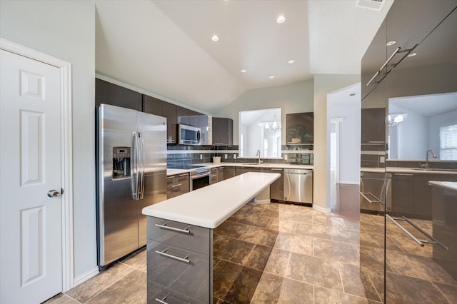4405 Westcliffe Dr, Mansfield, TX 76063 - kitchen with a sink, tasteful backsplash, modern cabinets, a center island, and stainless steel appliances