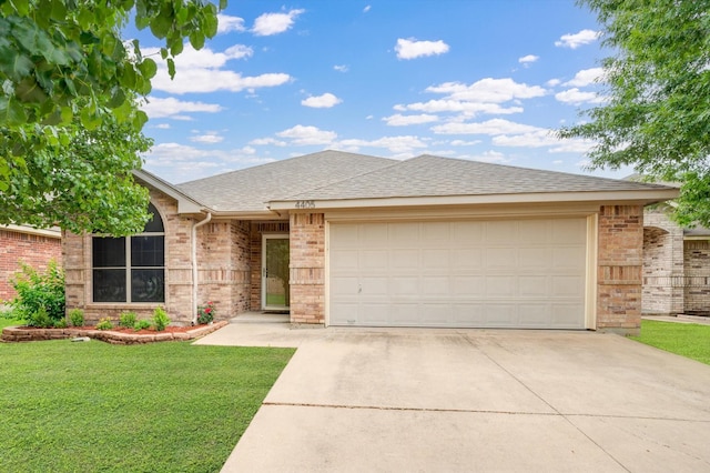 4405 Westcliffe Dr, Mansfield, TX 76063 - view of front of house with a front lawn, driveway, an attached garage, and brick siding