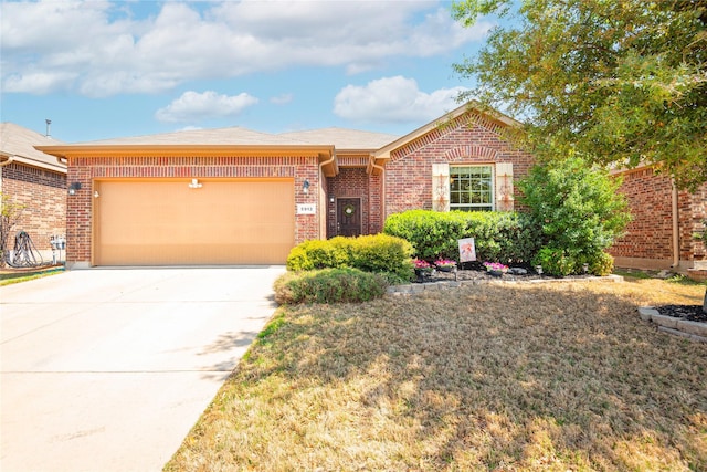 5912 Comanche Peak Dr, Fort Worth, TX 76179 - single story home with driveway, brick siding, and a garage