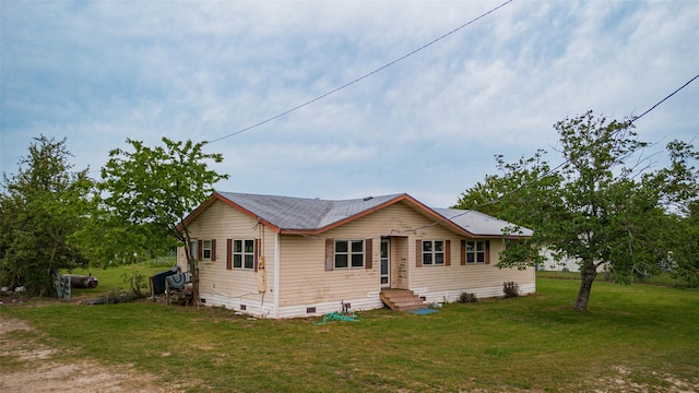 view of front of property with crawl space and a front yard