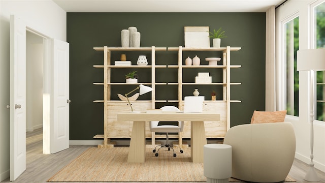 office with baseboards and wood finished floors