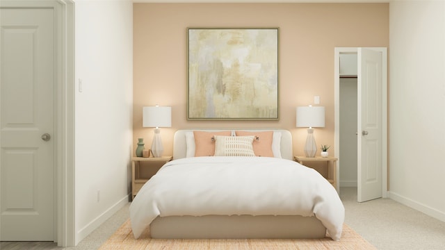carpeted bedroom with baseboards