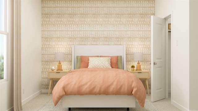 carpeted bedroom with baseboards