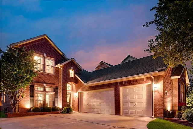 1431 Bonham Pkwy, Lantana, TX 76226 - view of front facade with brick siding, concrete driveway, and an attached garage