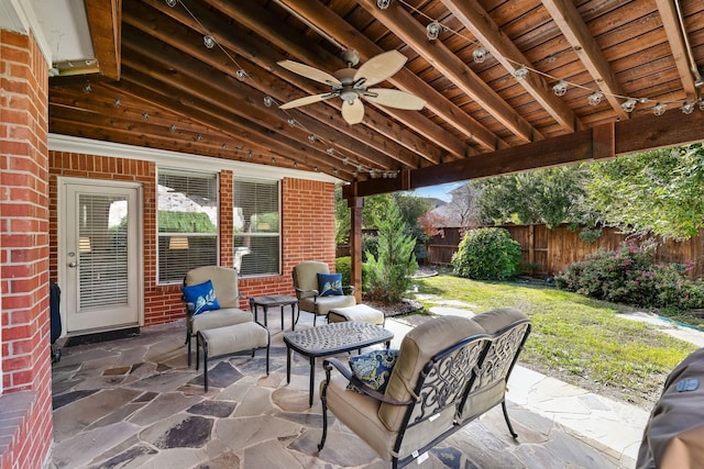1431 Bonham Pkwy, Lantana, TX 76226 - fenced backyard featuring a patio area and a ceiling fan