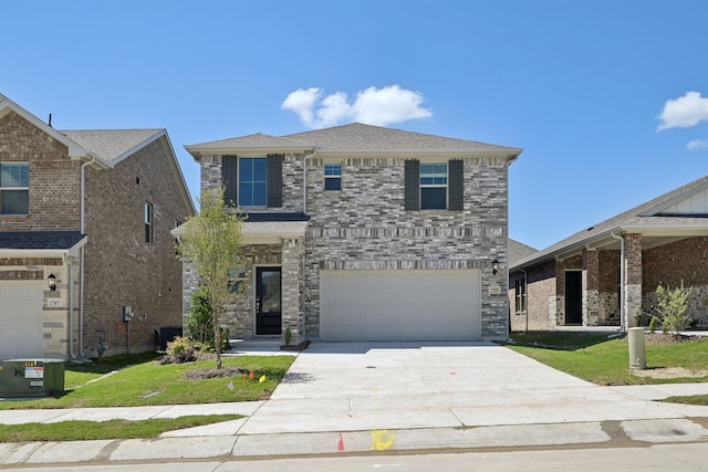 709 Caraway Dr, Princeton, TX 75071 - traditional-style home with a garage, driveway, and a front lawn