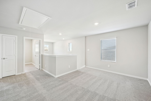 709 Caraway Dr, Princeton, TX 75071 - carpeted spare room featuring attic access, baseboards, and recessed lighting