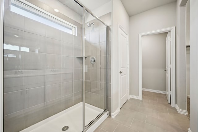 709 Caraway Dr, Princeton, TX 75071 - bathroom featuring a shower stall, baseboards, and tile patterned floors