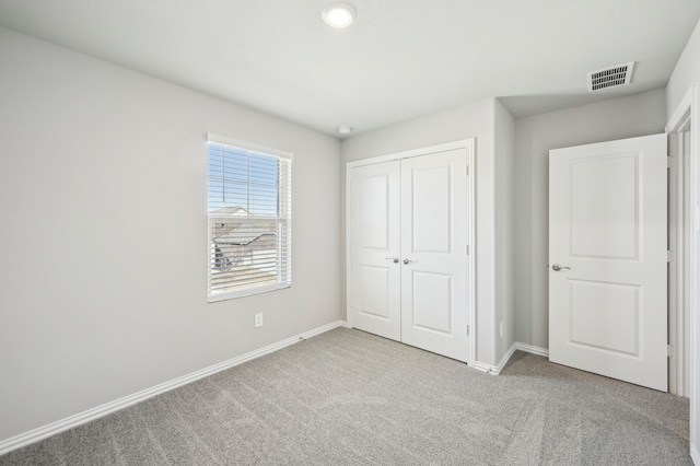 709 Caraway Dr, Princeton, TX 75071 - unfurnished bedroom with carpet floors, baseboards, and a closet