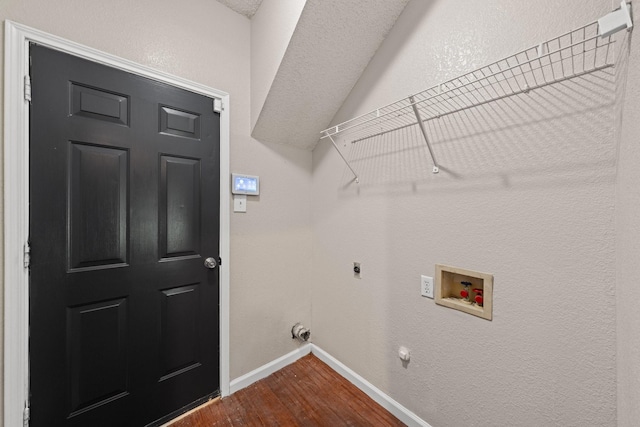 1403 Derby Dr, Kennedale, TX 76060 - washroom with washer hookup, dark wood-style floors, electric dryer hookup, and hookup for a gas dryer