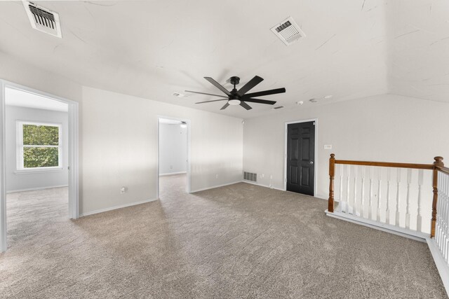 1403 Derby Dr, Kennedale, TX 76060 - carpeted empty room with a ceiling fan and vaulted ceiling