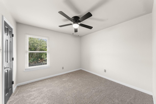 1403 Derby Dr, Kennedale, TX 76060 - carpeted spare room with baseboards and ceiling fan