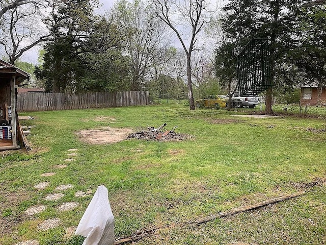 view of yard with fence
