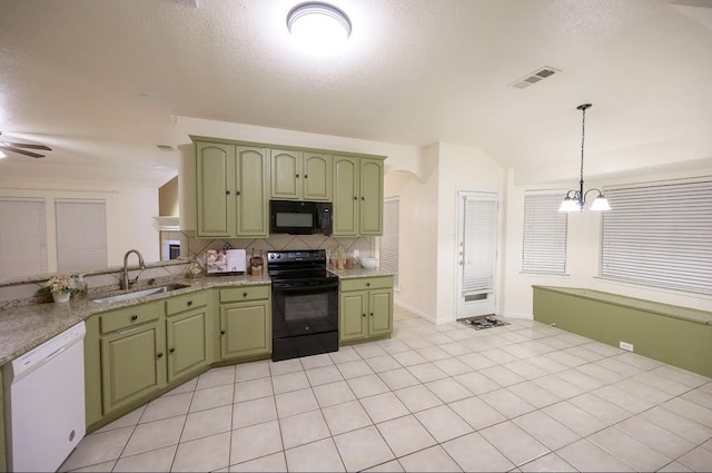 8729 Shavano Dr, Fort Worth, TX 76123 - kitchen with black appliances, green cabinetry, a sink, backsplash, and a textured ceiling