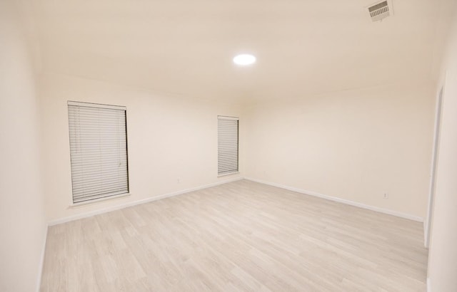 8729 Shavano Dr, Fort Worth, TX 76123 - spare room with light wood-style floors, baseboards, and recessed lighting