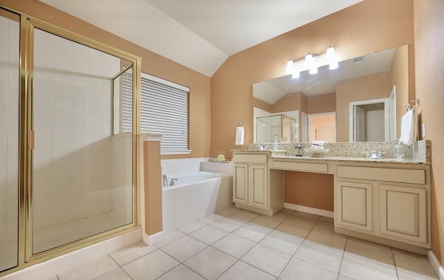 8729 Shavano Dr, Fort Worth, TX 76123 - full bathroom with a shower stall, a garden tub, tile patterned floors, double vanity, and vaulted ceiling