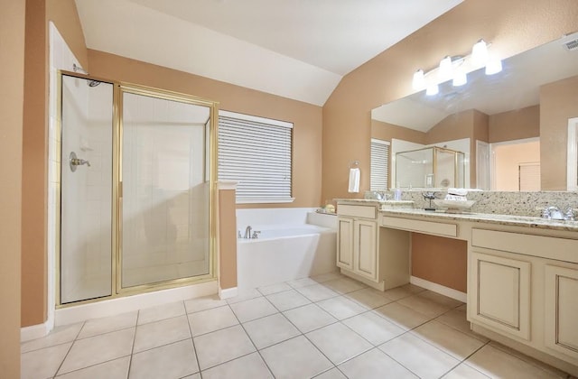 8729 Shavano Dr, Fort Worth, TX 76123 - bathroom with a stall shower, a bath, vanity, lofted ceiling, and tile patterned flooring