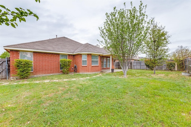 8729 Shavano Dr, Fort Worth, TX 76123 - rear view of property with brick siding, a patio, and roof with shingles