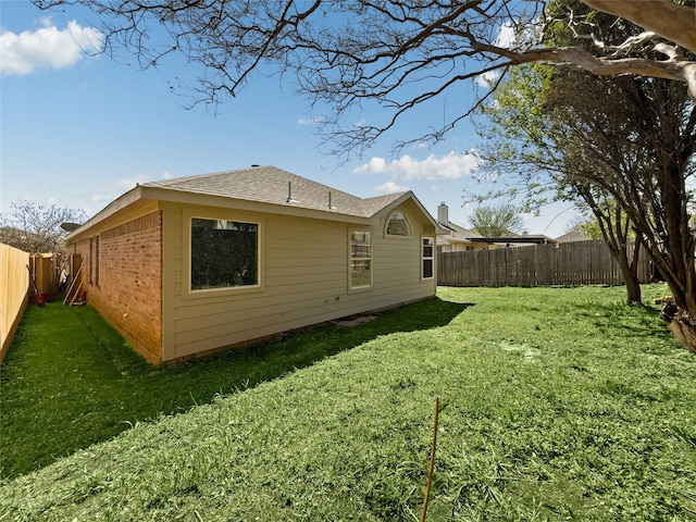 4512 Stepping Stone Dr, Fort Worth, TX 76123 - back of house featuring brick siding, a fenced backyard, and a yard