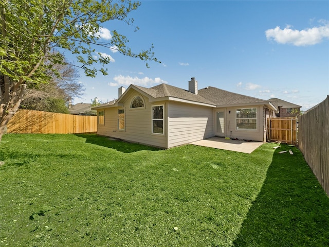 4512 Stepping Stone Dr, Fort Worth, TX 76123 - rear view of property with a fenced backyard, a chimney, and a lawn