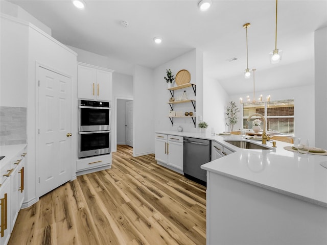 4512 Stepping Stone Dr, Fort Worth, TX 76123 - kitchen with a sink, open shelves, appliances with stainless steel finishes, light wood-style flooring, and white cabinets